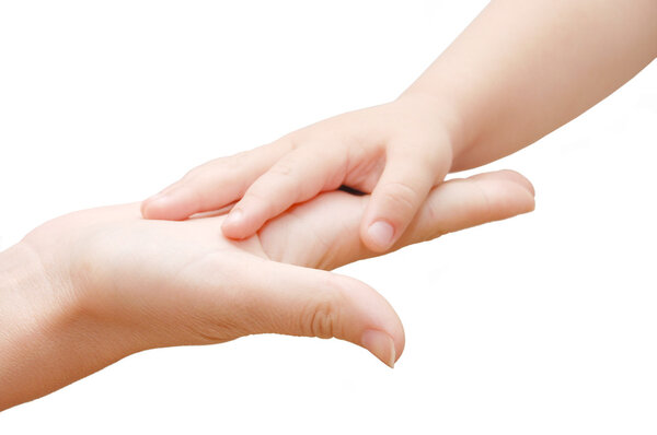 Small kids hand in woman hand on white