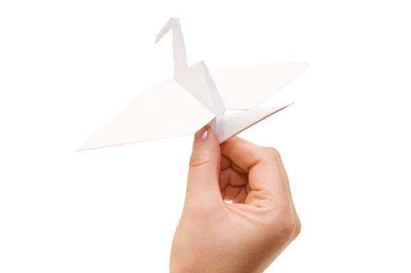 Grúa de origami en mano aislada en blanco —  Fotos de Stock