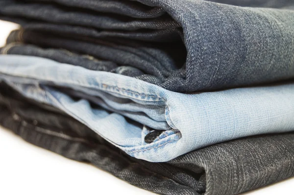 Набор джинсов изолирован на белом — стоковое фото