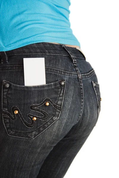Blanco visitekaartje in jeans zak — Stockfoto