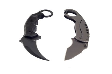 Two karambit on white background isolate clipart