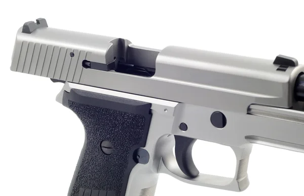 Пистолет на белом фоне изолирован — стоковое фото