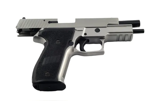 Pistola sobre fondo blanco aislado — Foto de Stock