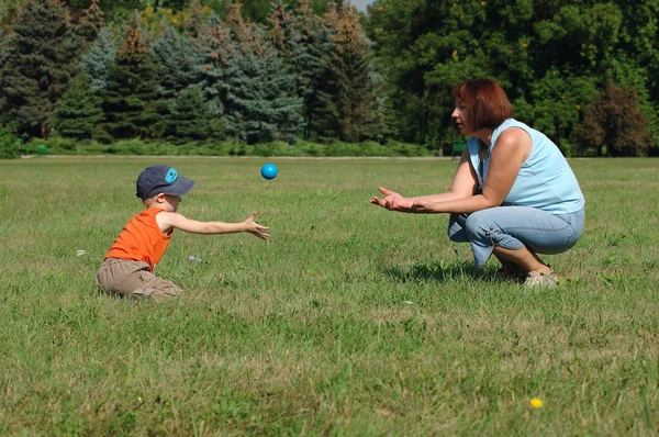 Grandmother and grandson are playing — Stock Photo, Image