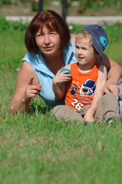 Grandmother and grandson in the park — Stock Photo, Image