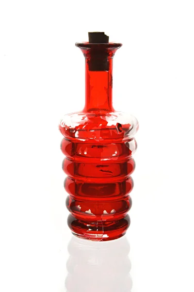 Eski kırmızı şişe — Stok fotoğraf