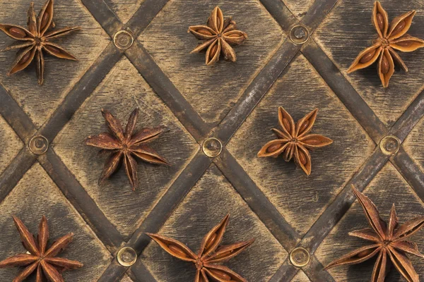 Star anise on old wood — Stock Photo, Image