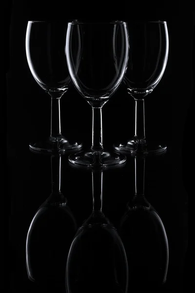 Three glasses on black — Stock Photo, Image