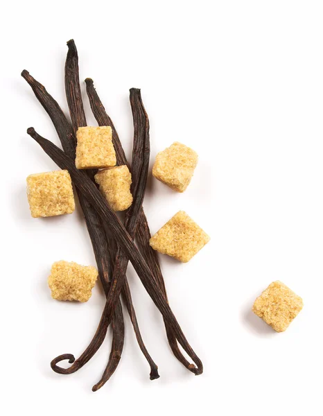 Vanilla beans and brown sugar — Stock Photo, Image