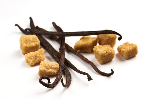 Vanilkové lusky a hnědý cukr — Stock fotografie