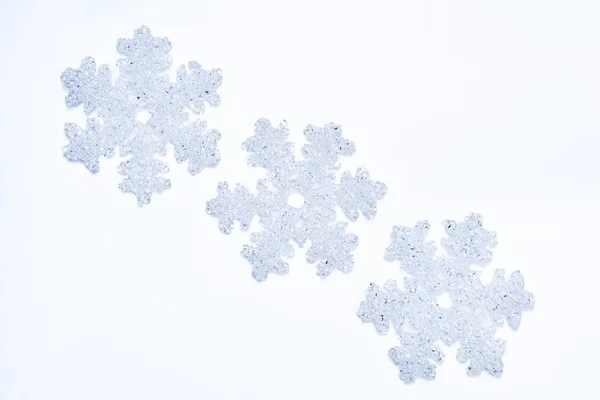 Trzy ze szkła płatki śniegu — Zdjęcie stockowe