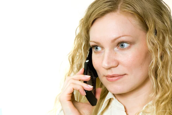 stock image Pretty woman talking on her cell phone.