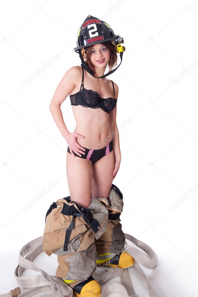 Download - Sexy Female Firefighter in fire gear and bra - Stock Image. 