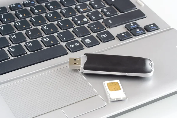 Notebook with modem usb 3G — Stock Photo, Image