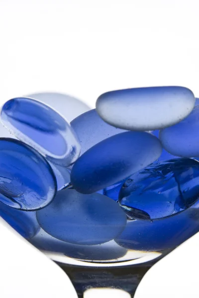 Blå sten på glas — Stockfoto