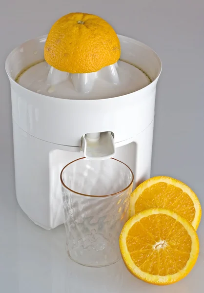 Апельсиновый сжиматель — стоковое фото
