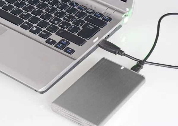 Laptop with hard disk — Stock Photo, Image