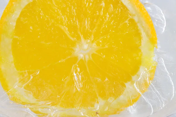 Orange on ice — Stock Photo, Image