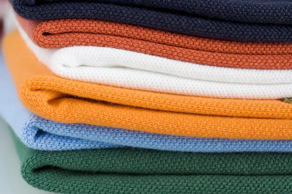 Colored polo shirt pile — Stok fotoğraf