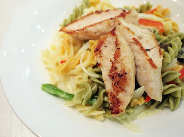 Grilled chicken brest with fusilli — Stock Photo, Image