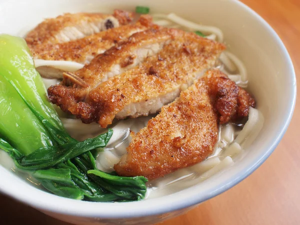 Chinese style noodles with fried pork — Stock Photo, Image