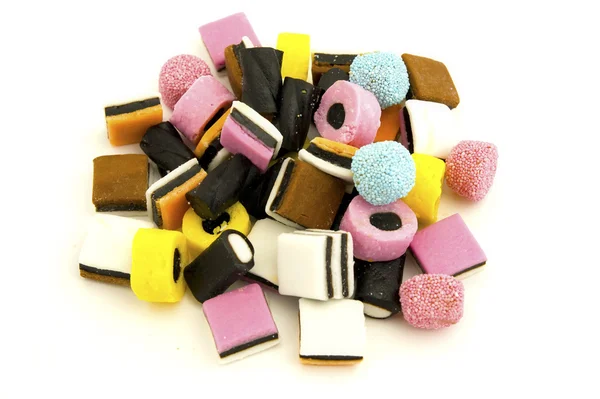 stock image Liquorice sweets against white