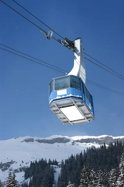Cable car with specs of snow — Stock Photo, Image
