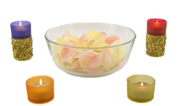 Candles and rose leaves — Stock Photo, Image