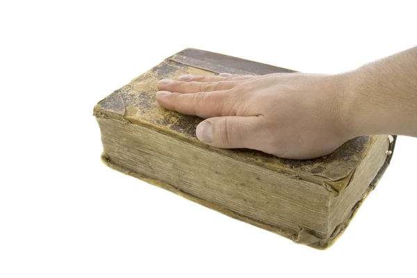 Mão masculina na bíblia vintage i — Fotografia de Stock