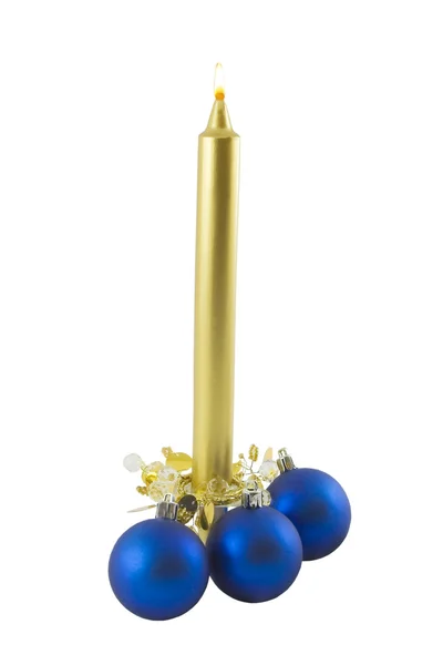 Goldene Kerze und Weihnachtsspielzeug — Stockfoto