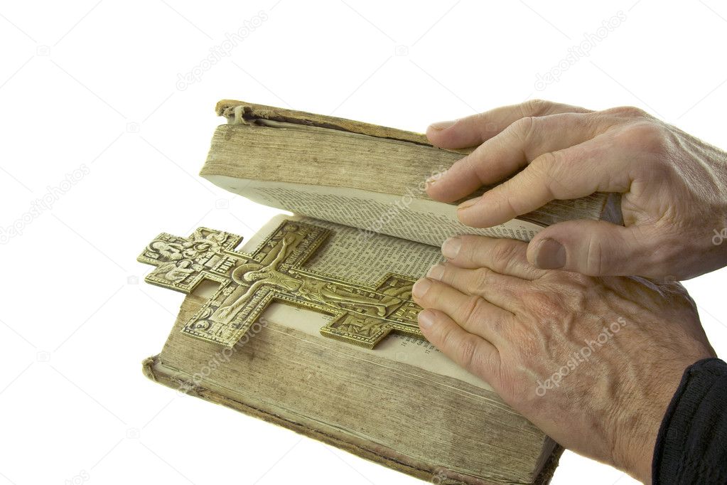 Male hand closed the vintage bible