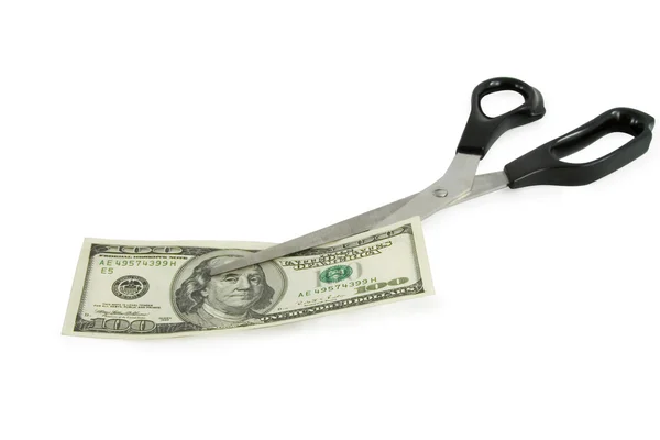 Scissors cutting a 100 dollars — Stock Photo, Image