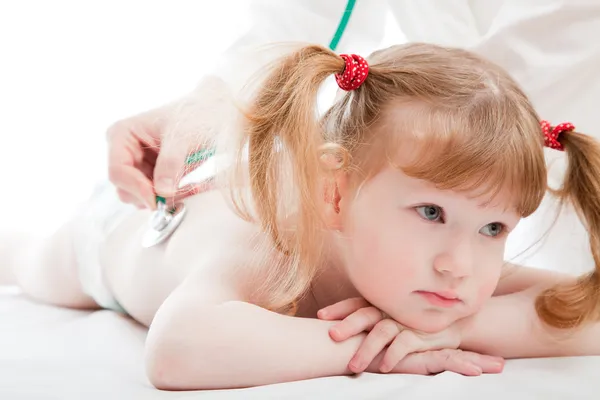 Cute child and a doctor — Stock Photo, Image