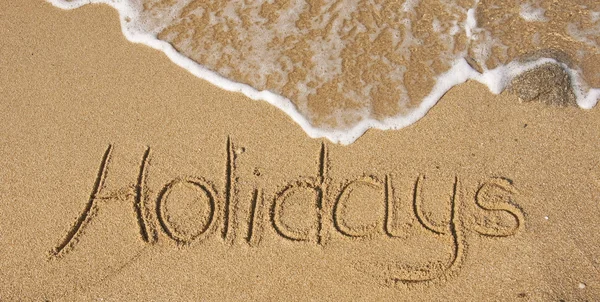 A inscrição na areia - feriados — Fotografia de Stock