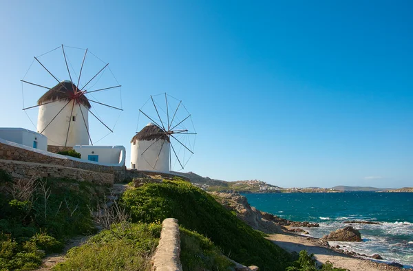 Windmills on a hillside near the sea — Stock Photo, Image