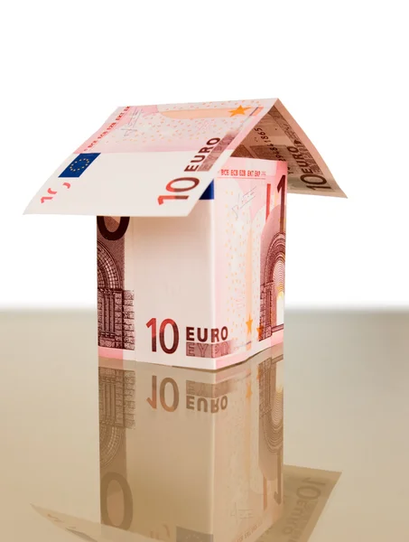 stock image Small house from a banknote ten euros