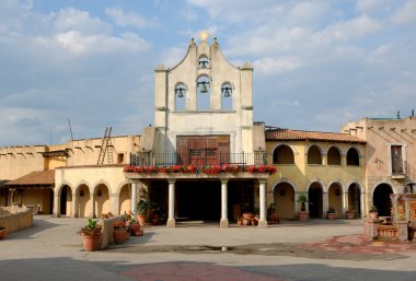 Street in the colorful Mexican village clipart