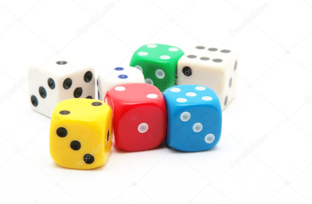 Colored dice on white background