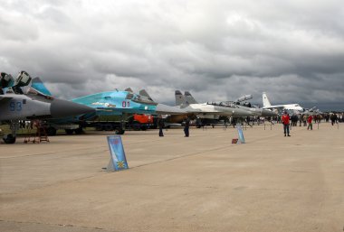 Military planes at an exhibition clipart