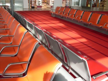 Red chair in the waiting room clipart