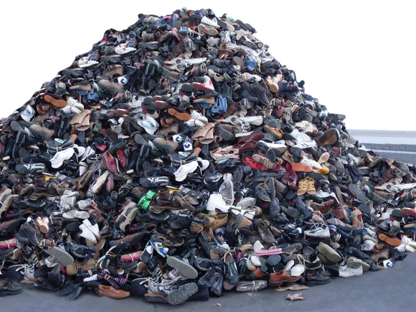 Heap of old footwear — Stock Photo, Image