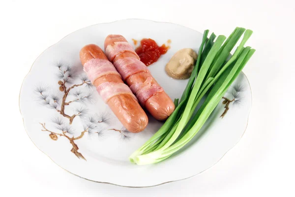 Sausages with a bacon — Stock Photo, Image