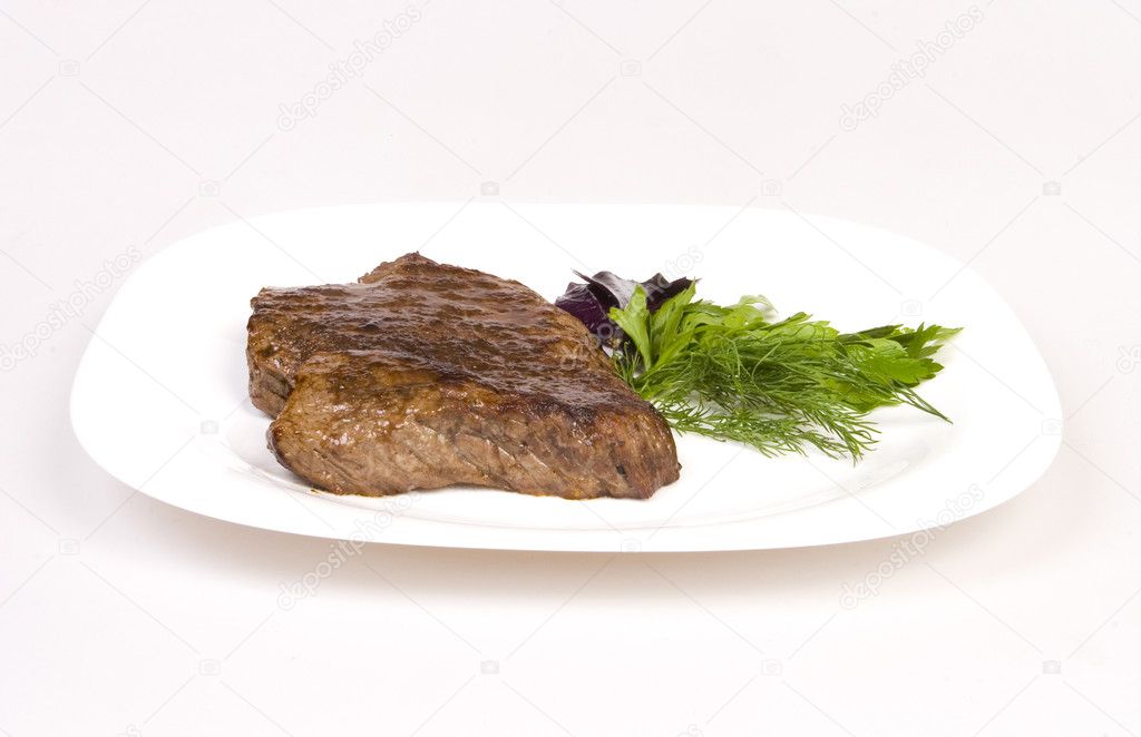 Fried beef steak with herbs
