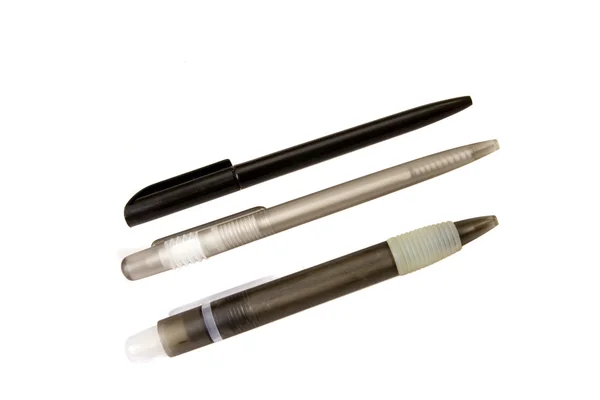 Tre svart plast pennor — Stockfoto