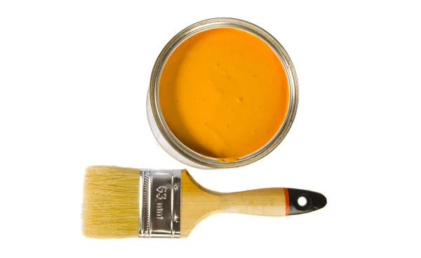 Orangefarbene Farbe und Pinsel — Stockfoto
