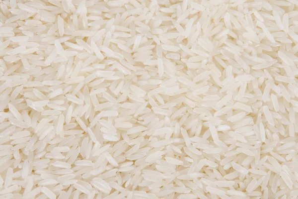Tle biały ryż — Zdjęcie stockowe