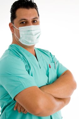 Male doctor posing with face mask clipart