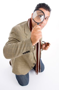 Detective with magnifying glass clipart