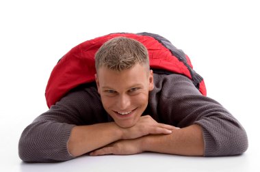 Handsome man in sleeping bag clipart