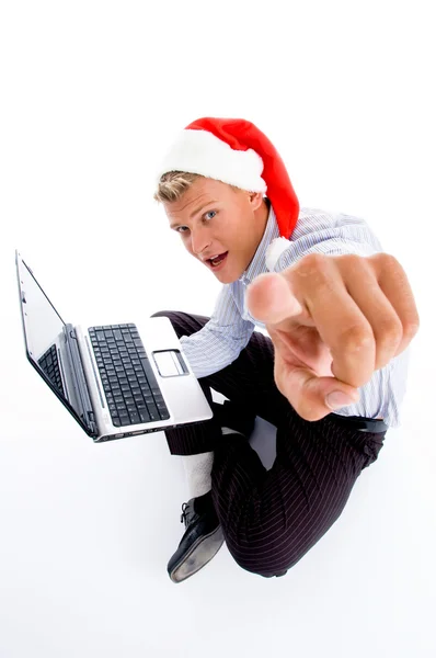 Pointing man with christmas hat — Stock Photo, Image